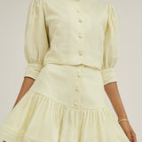 Laney – Pastelselt sidrunine frill seelikshorts