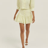 Laney – Pastelselt sidrunine frill seelikshorts