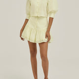 Laney – Pastelselt sidrunine frill seelikshorts