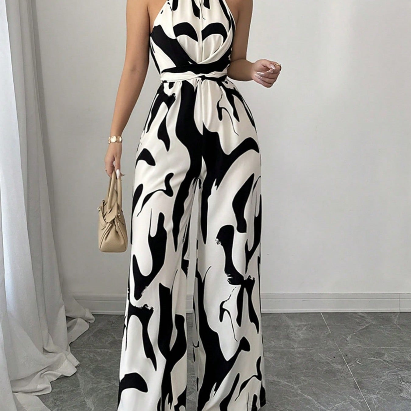 Halter – Stiilne jumpsuit abstraktse printimisega