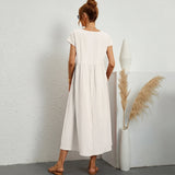 Inês – Elegantne midi kleit taskutega