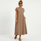 Inês – Elegantne midi kleit taskutega