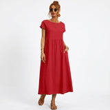 Inês – Elegantne midi kleit taskutega