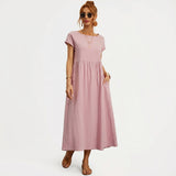 Inês – Elegantne midi kleit taskutega