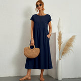 Inês – Elegantne midi kleit taskutega