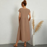 Inês – Elegantne midi kleit taskutega