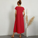 Inês – Elegantne midi kleit taskutega