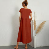 Inês – Elegantne midi kleit taskutega