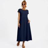 Inês – Elegantne midi kleit taskutega
